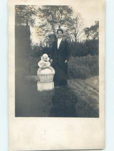 Pre-1929 rppc CHILD WITH MOM AT STUDEBAKER PARK Elkhart Indiana IN HM3810