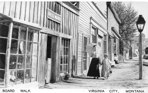 J55/ Virginia City Montana RPPC Postcard c1950s Interior Board Walk Girls 346