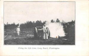 Long Beach Washington Firing the Life Line cannon men antique pc Z41366