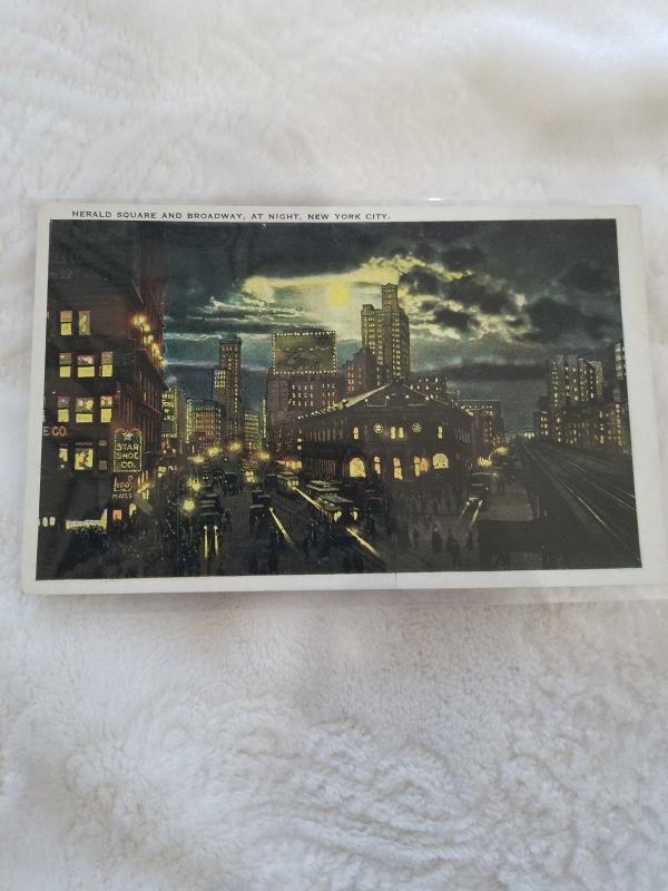 Antique Postcard entitled, Herald Square and Broadway at Night, New York City