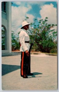 Policeman Nassau Bahamas Guard Rifle Flower Bush Malcuna Shops Inc UNP Postcard 