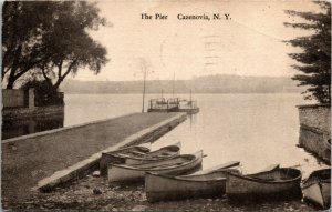 Postcard NY Cazenovia Canoes at Pier on Lake Cazenovia 1935 M26