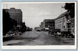 Huron South Dakota SD Postcard RPPC Photo Dak Avenue Looking North Cars 1921