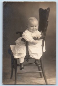 Cute Baby Postcard RPPC Photo Paul Murnaugh Sat On Chair Studio 1912 Antique