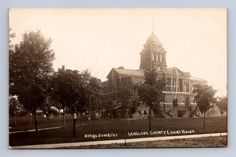 RPPC LANGLADE COUNTY COURT HOUSE ANTIGO WISCONSIN REAL PHOTO POSTCARD (c.1910)