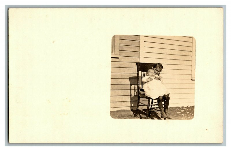 RPPC Girl Holding Baby Sitting On Chair Outside Vintage Standard View Card 