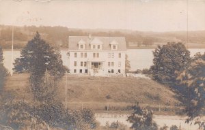 LARGE HOUSE BUILDING UNDER CONSTRUCTION ON RIVER~1910s REAL PHOTO POSTCARD