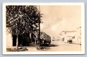 J90/ Marion Wisconsin RPPC Postcard c1910 Main Street Stores Wagon 31