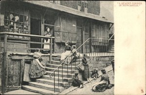 Newcastle Tyne and Wear England Woman and Children on StoopVintage Postcard