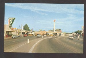 INDIO CALIFORNIA DOWNTOWN STREET SCENE OLD CARS STORES VINTAGE POSTCARD