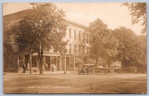 K32/ Lima New York RPPC Postcard c1910 East Main Street Stores Jenks 1471