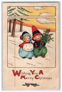 c1910's Christmas Cute Children Handwarmer Holly Berries Winter Posted Postcard
