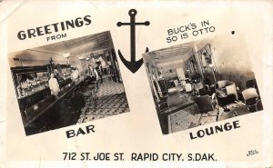 RPPC RAPID CITY SOUTH DAKOTA BUCKS BAR & LOUNGE REAL PHOTO POSTCARD (1940s)