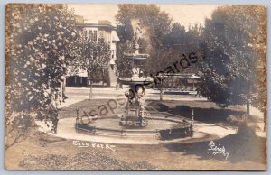 K49/ Coshocton Ohio RPPC Postcard c1910 City Park Fountain Trolley 141