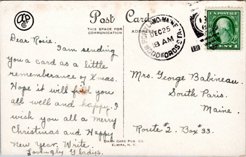 Postcard Merry Christmas - house in snow Owen Card Pub RMS Woodfords Station