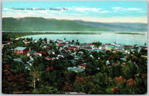 Greetings from Jamaica Montego Bay Buildings and Mountain Ocean View Postcard