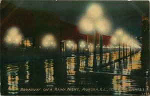 1920s Broadway On A Rainy Night, Aurora, Illinois, City of Lights Vtg Postcard