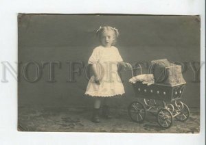 443844 Cute Girl & DOLL in perambulator Pram Vintage REAL PHOTO