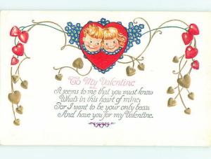 Unused Divided-Back Valentine BOY AND GIRL FACES ON HEART o5457