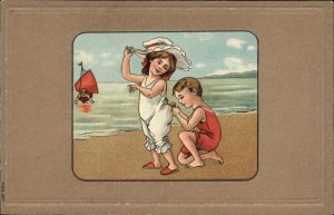 Little Boy Sews Back of Little Girl's Swimsuit Vintage Fashion c1910 Postcard