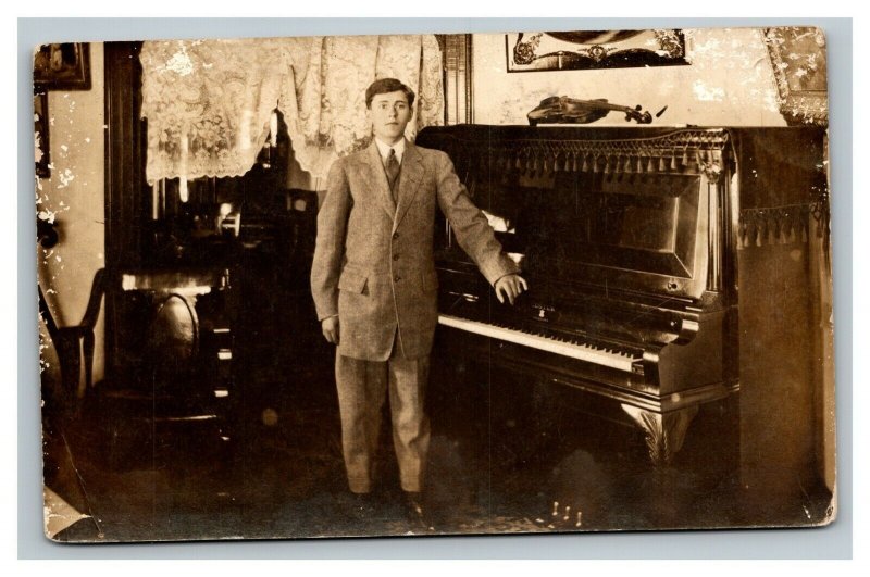 Vintage 1910's RPPC Postcard - Man Standing By Upright Piano Suburban Home