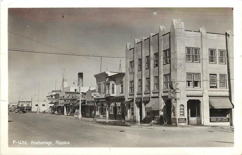 c1940 RPPC Postcard P-1632, Anchorage AK Street Scene Drugstore Sears etc Posted