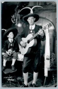 TIROL AUSTRIA GUITAR PLAYER VINTAGE REAL PHOTO POSTCARD RPPC