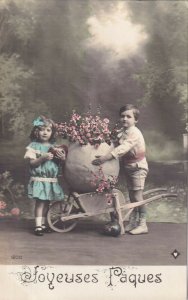 RP: EASTER, PU-1911; Joyeuses Paques Kids & Wheel Barrel, Flowers in egg shell