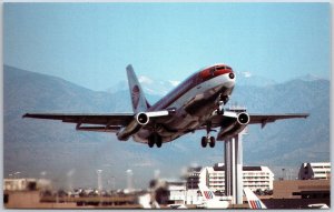 Airplane Boeing 737 Hybrid Color Scheme From Denver Stapleton Airport Postcard