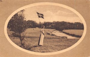 A751 Denmark Native Woman Holds Flag Ved Kongeaaen Foldingbro postcard