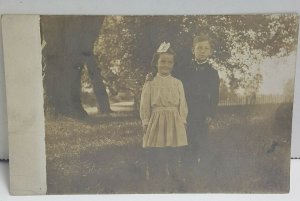 Children Boy Girl Outside House Real Photo Postcard Vintage Postcard