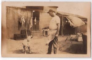 RPPC, Ft Riley KS. Cook Teasing Dog with a Chop