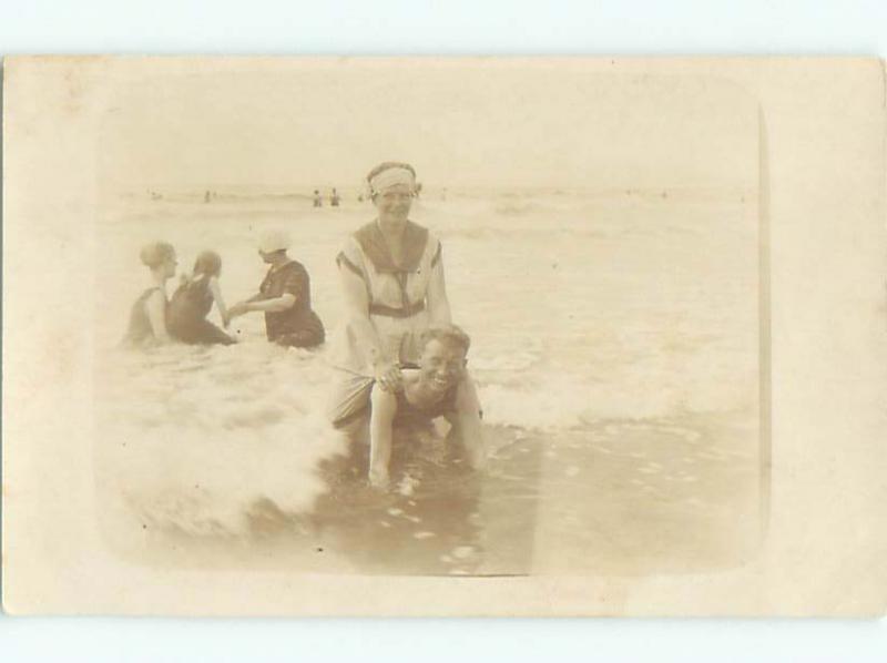 rppc 1920's RIDING PIGGYBACK AT THE BEACH AC8873