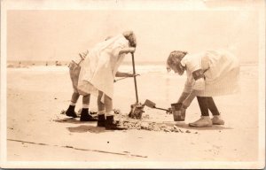 Real Photo Postcard Children Playing in the Sand on the Beach