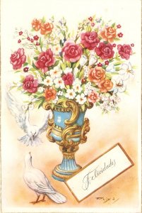 Beautiful flowers in art vase. Doves Nice  Spanish Greetings postcard 1950s