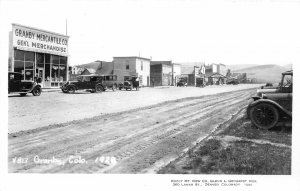 J11/ Granby Colorado RPPC Postcard c1950s Mercantile Store Autos  145