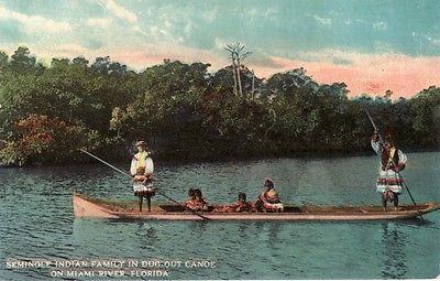 NATIVE AMERICANA -- Seminole Indian Family in Dug-Out Can...