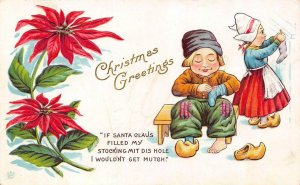 Holiday CHRISTMAS GREETINGS  Dutch Boy & Girl Hanging Stockings 1915 Postcard