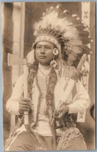 AMERICAN INDIAN BOY CHIEF TOMAHAWK PEACE PIPE HEADDRESS ANTIQUE REAL PHOTO RPPC