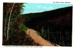 Postcard ROAD SCENE Laramie Wyoming WY AT7313
