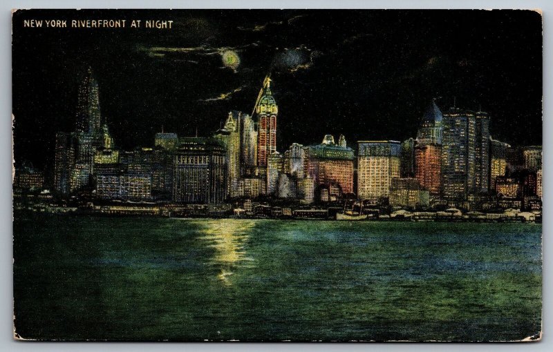 New York City Riverfront at Night Skyscrapers Buildings NY Vintage Postcard