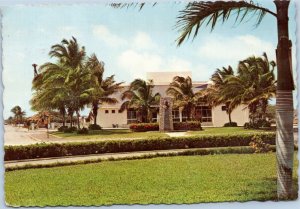 postcard Aruba - Cultural Centre exterior front view with palm trees