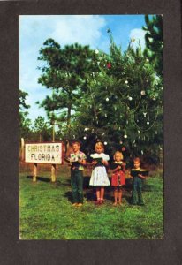 FL Children Singing front Christmas Tree Christmas Florida Postcard