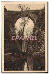 Postcard Old Paris while strolling Buttes Chaumont brick Bridge Park