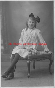 Studio Shot, RPPC, Girl with Flower Sitting on Hassock, James H Jamieson Photo