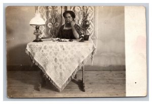 Vintage 1910's RPPC Postcard - Studio Portrait Victorian Woman Desk Antique Lamp