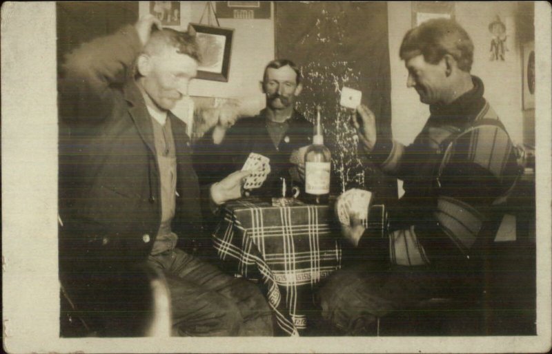 Silly Men Playing Cards Drinking Liquor Visible Bottle Christmas Tree c1910 RP 