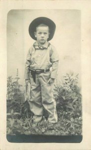 C-1910 Young Boy Cowboy Costume lasso RPPC Photo Postcard 21-11064