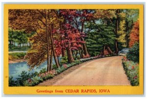 c1940's River Car Passing Greetings from Cedar Rapids IA Vintage Postcard