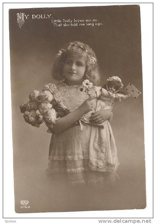 RP; Girl holding doll and bouquet of flowers, My Dolly. Little Dolly loves me...